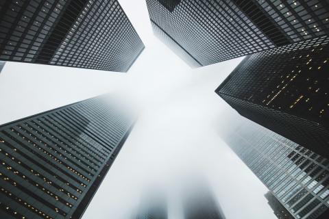 Surrounded by skyscrapers reaching into the sky